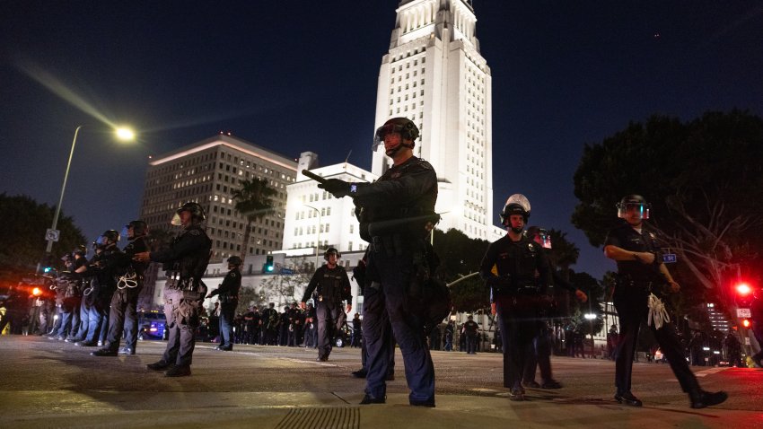 Los Angeles, CA – June 10: After curfew the LAPD guard the empty streets near City Hall in downtown Los Angeles on Tuesday, June 10, 2025 in Los Angeles, CA. (Jason Armond / Los Angeles Times via Getty Images)